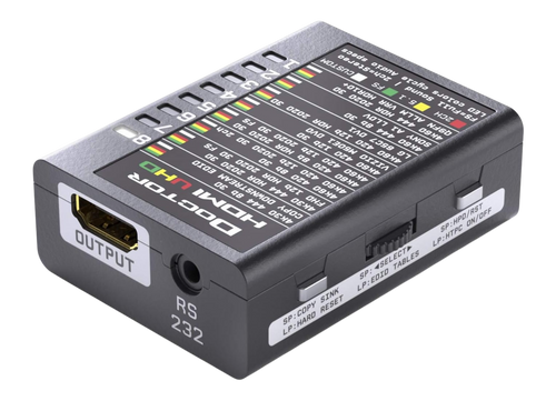 Dr HDMI 4K visto desde el lado de salida, con la tabla de bancos EDID UHD impresa en la tapa